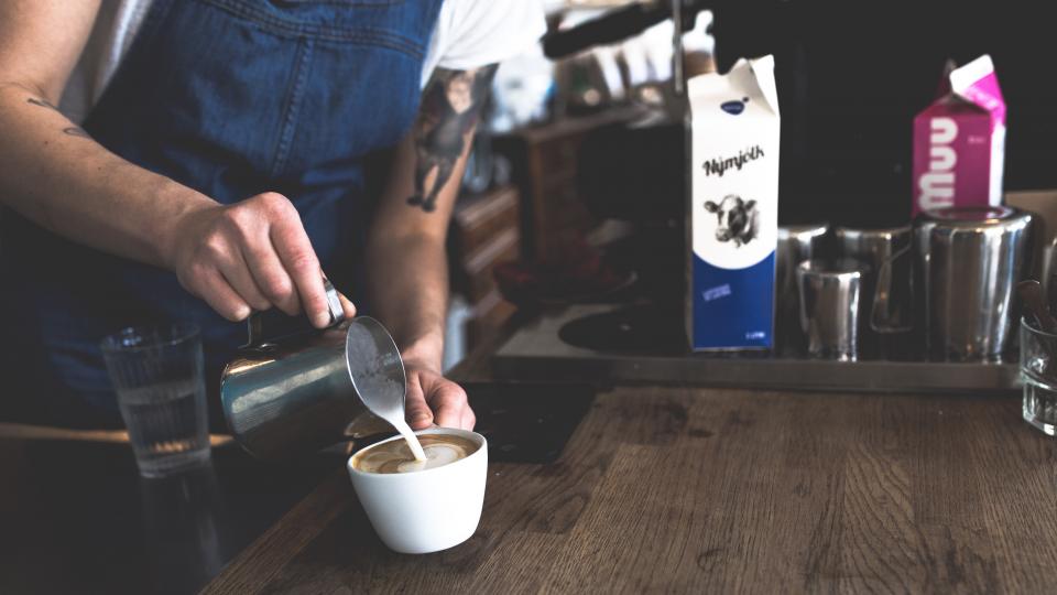 Barista making coffee